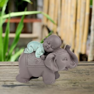 Statue bonze sur éléphant