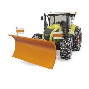 Claas axion 950 avec chaînes à neige et