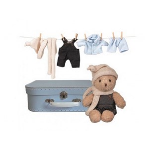 Morris et ses habits dans une valise