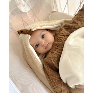 Nid d'ange bébé moumoute beige