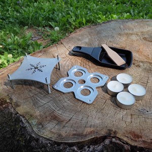 Appareil à raclette à la bougie adapté pour la randonnée et pour la maison.