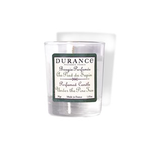 Mini bougie parfumée au pied du sapin