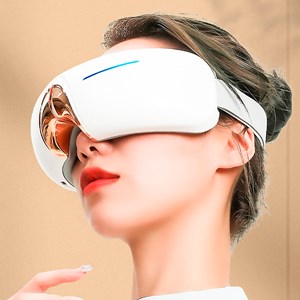 Masseur oculaire avec 4 modes de vibration, mode chaleur et compression chaude.