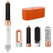 Sèche-cheveux 5 en 1, permet de lisser, sécher, boucler et bien plus encore.