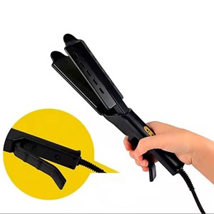 Fer à lisser avec indicateur de température et 4 niveaux de chaleur.