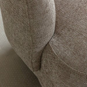 Fauteuil arrondi taupe