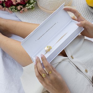 Marque-page doré – fleur et perle