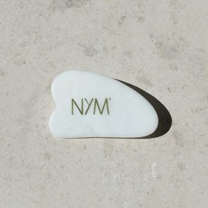 Gua sha en pierre naturelle, outil de massage visage éclat et fermeté.