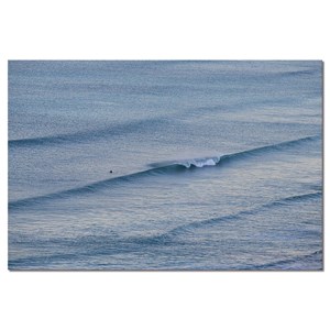 Toile deco surfeur solitaire