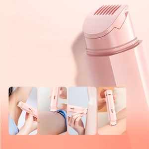 Rasoir féminin spécial pour zones délicates, double tête de coupe et de rasage.