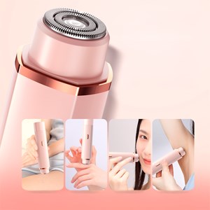 Rasoir féminin spécial pour zones délicates, double tête de coupe et de rasage.