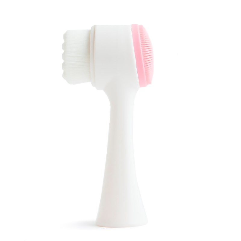 Brosse faciale en silicone multifonction double face pour le massage.