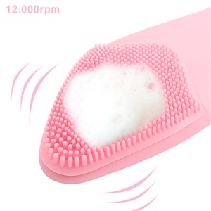 Brosse exfoliante et masseur portable, fonctionnement sur piles.