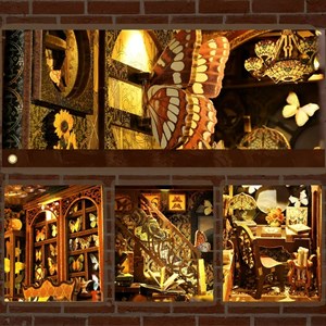 Collection de papillons. Book nook en bois, design 3d réaliste.