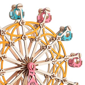 Puzzle en 3d en bois. Grande roue multicolore. 295 pièces.