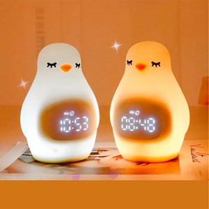 Réveil avec veilleuse pour enfants, intensité réglable. Design pingouin.