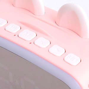 Réveil lcd avec lumière nocturne, haut-parleur bluetooth intégré, thermomètre.