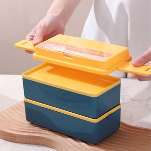 Boîte hermétique de 2 étages pour conserver les aliments. Inclut des couverts.