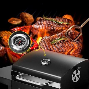 Barbecue portable en fonte avec plateau de braises.