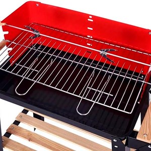 Barbecue à charbon portable avec roues et broche.