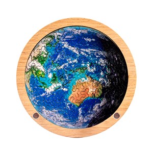 Puzzle et cadre en bois avec 34 pièces. Design terre.