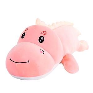 Oreiller extra doux et moelleux design dinosaure rose. 50 cm.