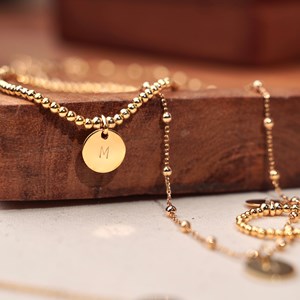 Bracelet à perles médaille