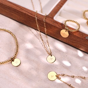 Bracelet à perles médaille