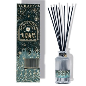 Diffuseur de parfum au pied du sapin