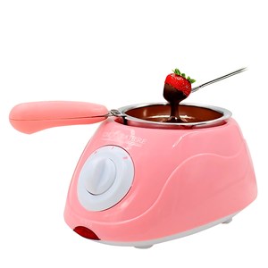 Chocolatière électrique avec plusieurs accessoires.