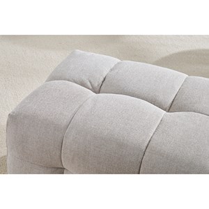 Pouf repose-pieds en tissu effet velours texturé beige corto