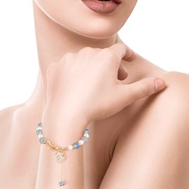 Ensemble de bracelet et collier assortis avec pendentif en trèfle.