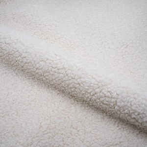 Fauteuil blanc en tissu effet laine bouclette - glam