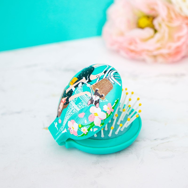 Brosse à cheveux avec miroir bleu 2