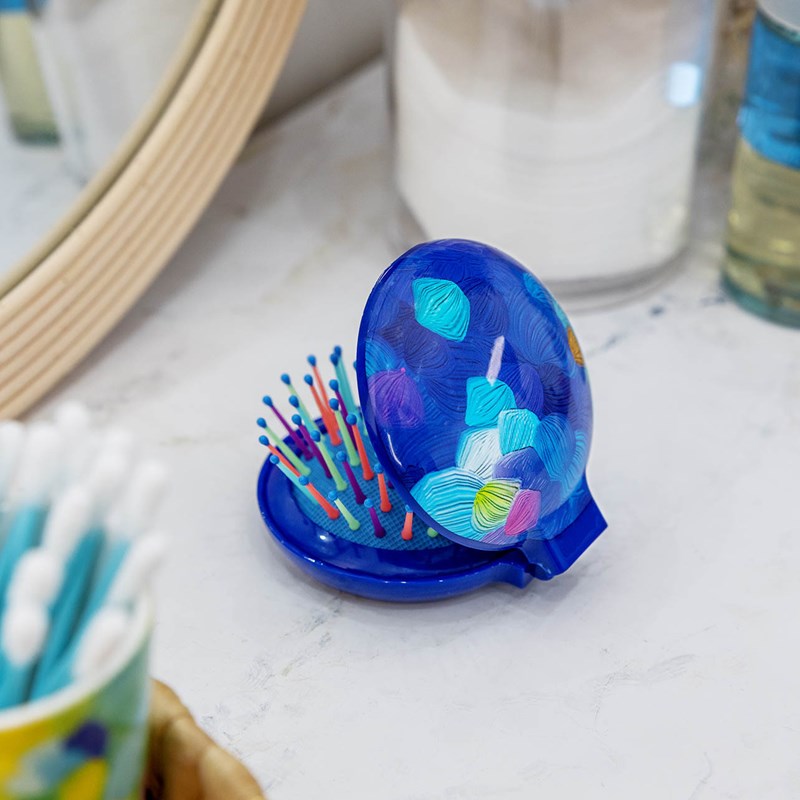 Brosse à cheveux avec miroir bleu
