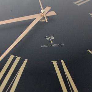 Horloge murale chiffres romains silencieuse