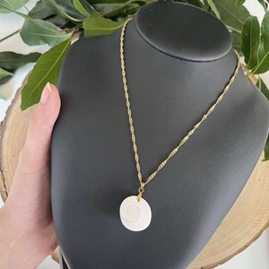 Pendentif œil de sainte-lucie doré