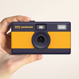 Appareil photo peeksme jaune + 1 paire de clips rose + 1 lanière bleue