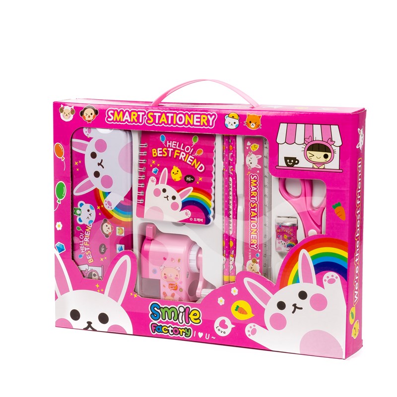 Set de papeterie avec étui métallique et accessoires d'écriture.