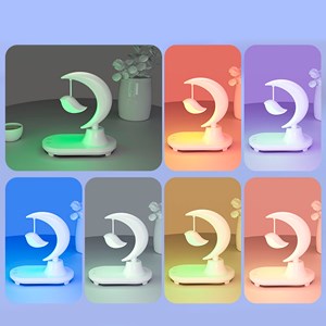 Lampe led multicolore avec chargeur sans fil et haut-parleur bluetooth.