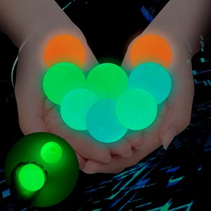 Boule en silicone anti-stress de 5,5cm, brille dans l'obscurité.