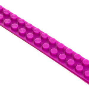 Ruban adhésif pour jeux de construction