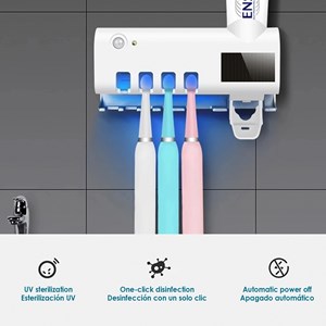 Stérilisateur et support pour 4 brosses à dents avec distributeur de dentifrice.