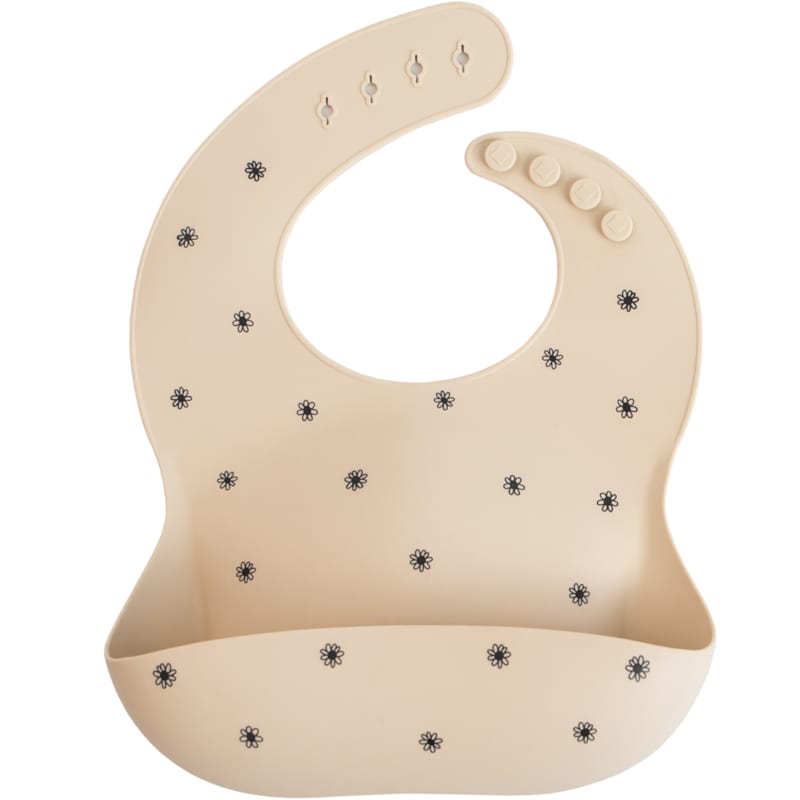 Bavoir à poche en silicone black daisy (Mushie) - Image 1