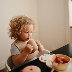 Bavoir à poche en silicone rocket