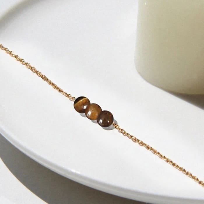 Bracelet oeil de tigre camelia or