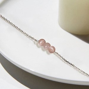 Bracelet pierre de soleil camelia or