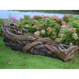 Fontaine de jardin allongée avisio souche d'arbre avec chute d'eau et éclairage