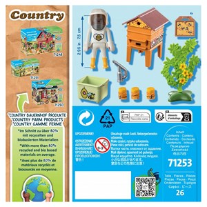 Apicultrice avec ruche