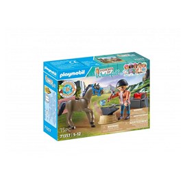 Maréchal ferrant et son cheval